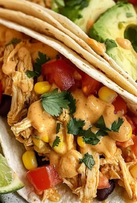 Slow Cooker Queso Chicken Tacos