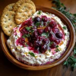 Cranberry whipped feta dip with crackers delights all!